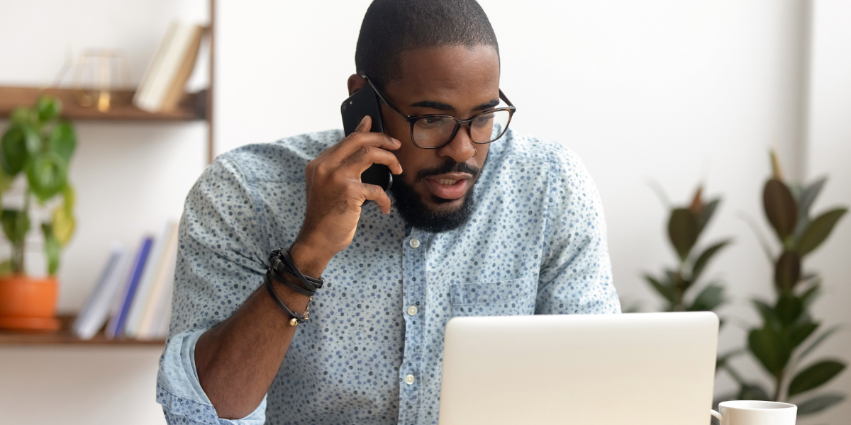 A professional conducting a phone interview, showcasing the importance of clear communication and preparation.